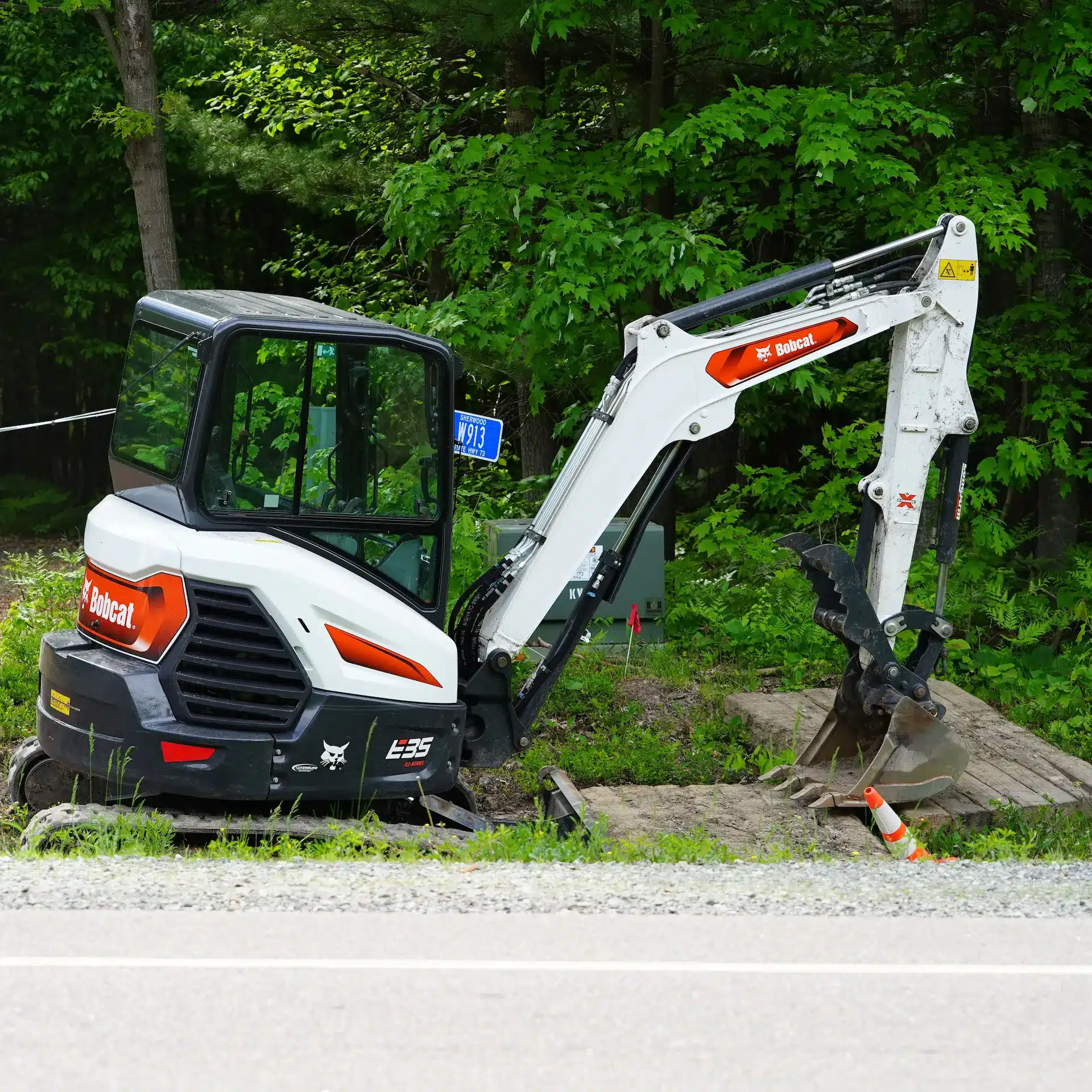 A bobcat excavating on a small job.