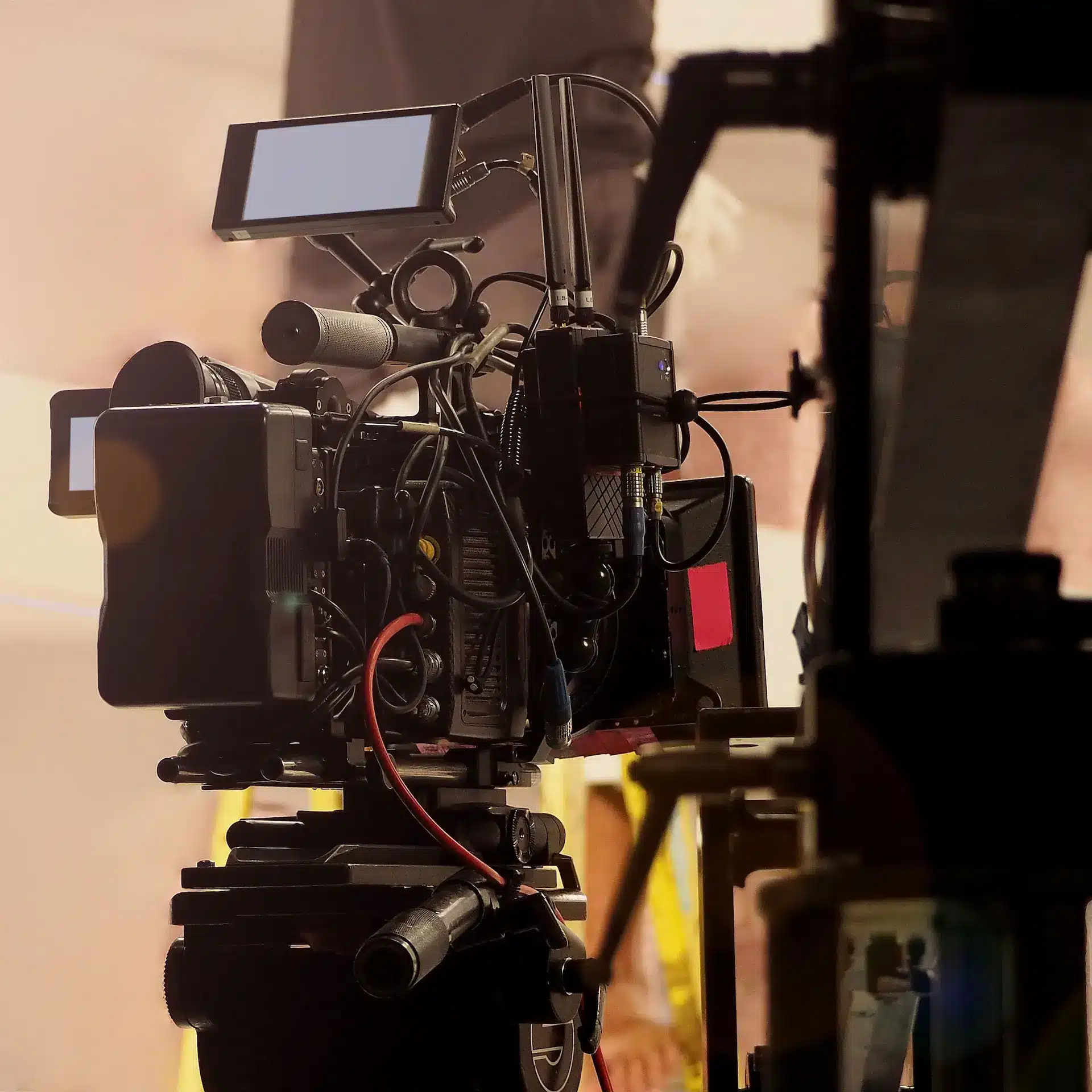 Professional camera gear and accessories in use in a studio shoot.