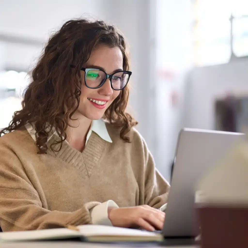 A young professional researching commercial loans for a company project.