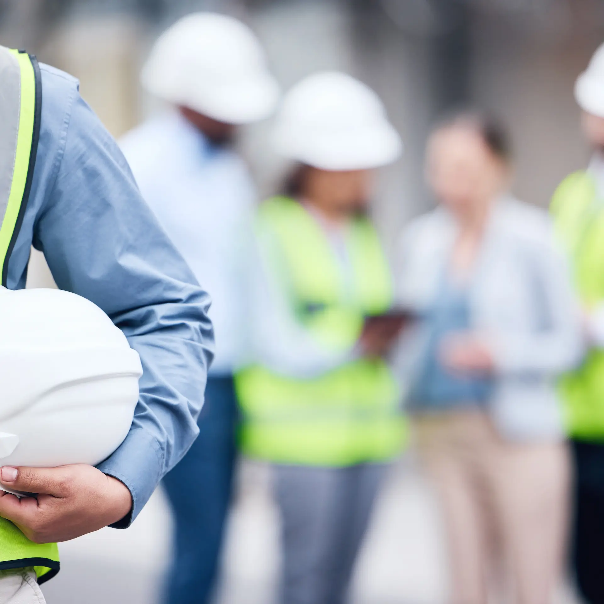 Several engineers and planners on a construction site.