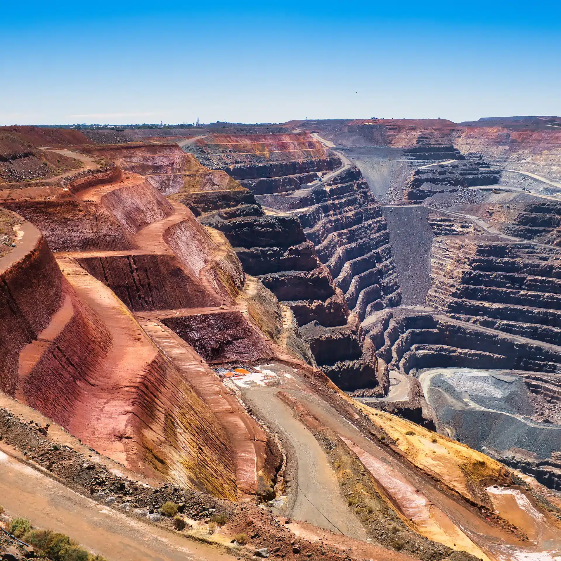 An open cut mine in Australia represents a large scale mining operation.