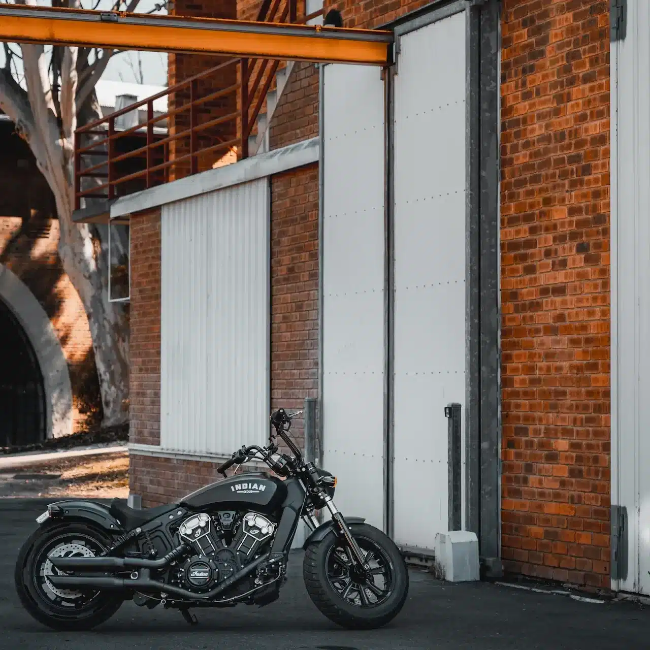 Motorcycle parked outside a warehouse in Perth WA