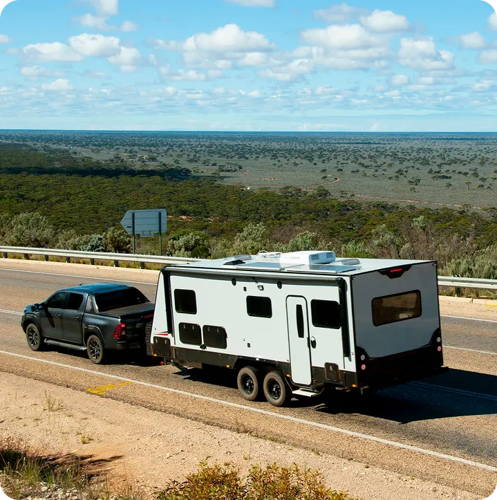 Ute towing caravan, fast caravan finance approvals helping Australian dealers deliver caravans to customers sooner.
