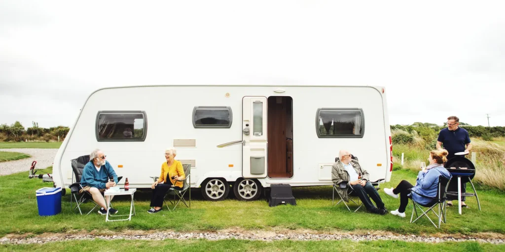Group of friends enjoying the caravan they purchased with a shared caravan loan that had affordable finance
